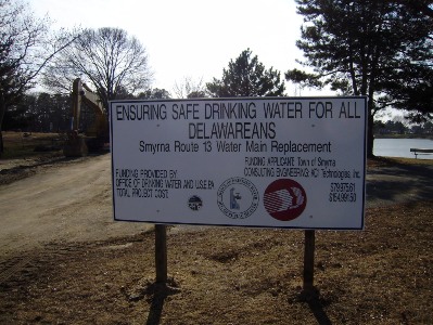 Sign announcing the Route 13 water mainreplacement.