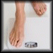 thumbnail photo of feet on a scale
