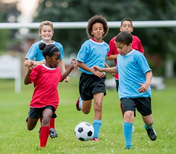 Kids playing soccer