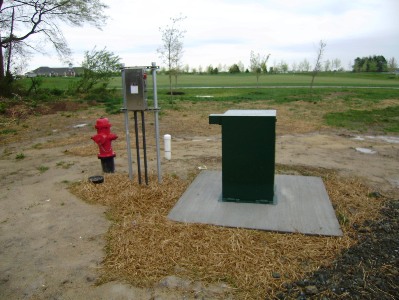 Completed well with well head protection.